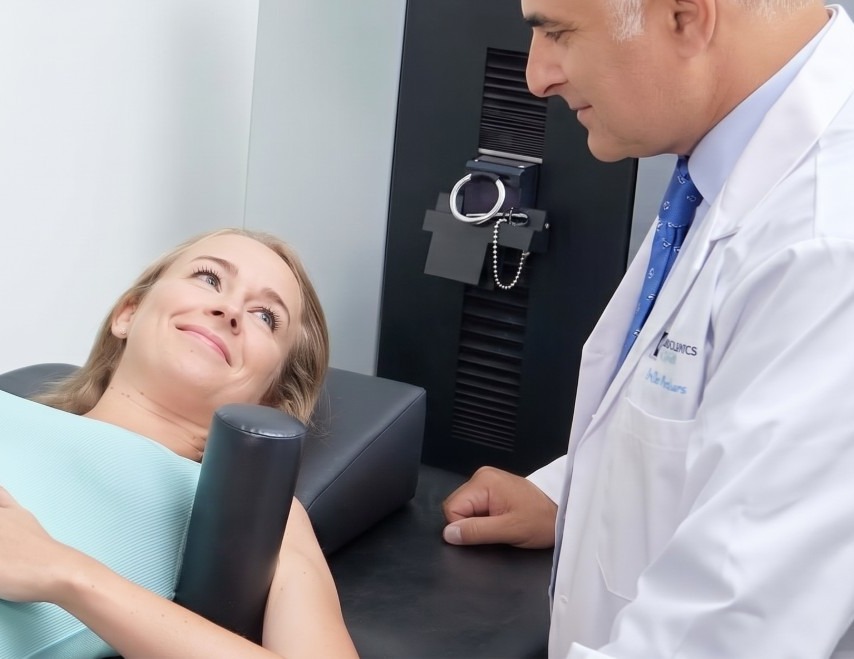 Dr. Ron Nusbaum treating a patient with non-surgical spinal decompression